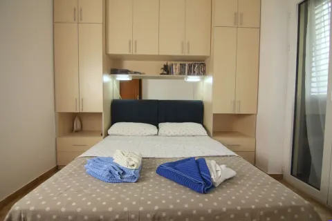 Furnished bedroom with a double bed and built-in wardrobes. - image 6