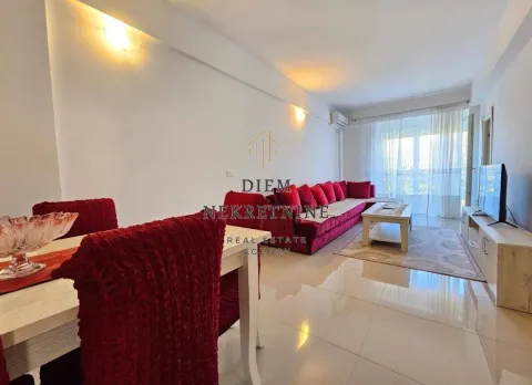 Living room with a sofa set and a dining table. - image 4