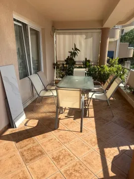 Spacious terrace with seating furniture and a view. - image 15