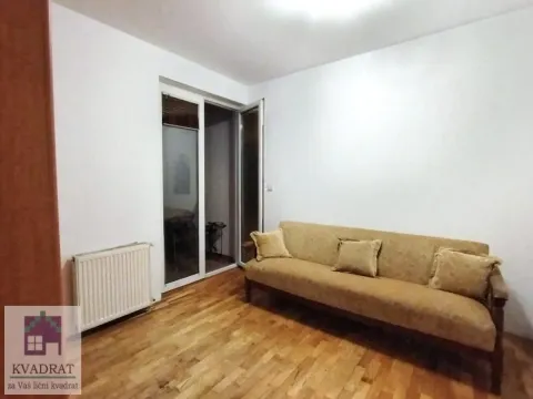 Living room with a sofa and access to the terrace. - image 7