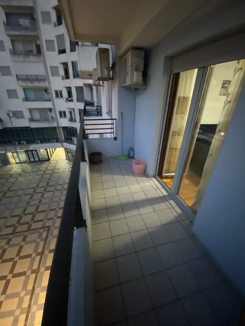 Balcony overlooking the building courtyard.