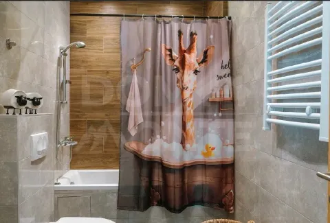 Modern bathroom equipped with a shower, bathtub, and ceramic tiles. - image 18