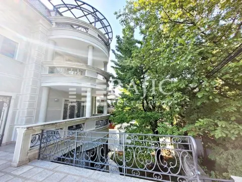 Exterior of a multi-family building with balconies and a yard. - image 10