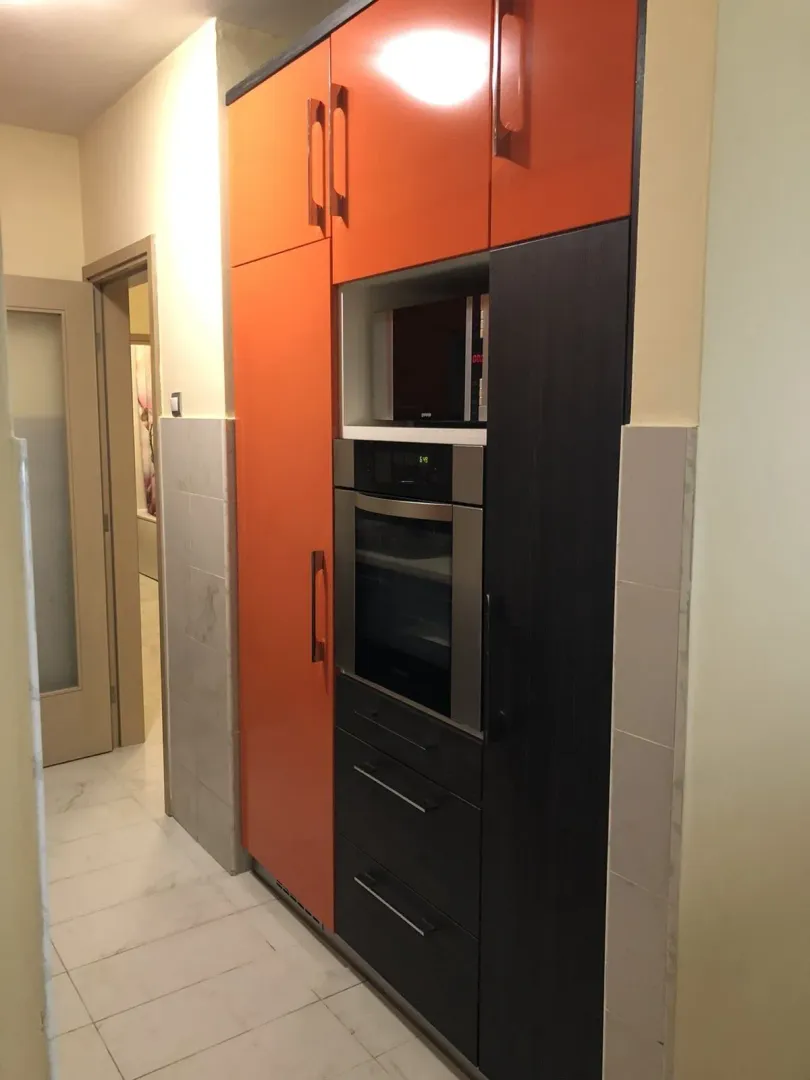 Kitchen cabinets with built-in appliances.