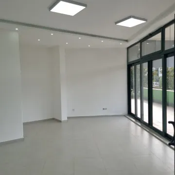 Empty and bright space with large glass doors. - image 8
