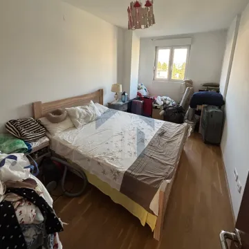 Furnished bedroom with a double bed. - image 14
