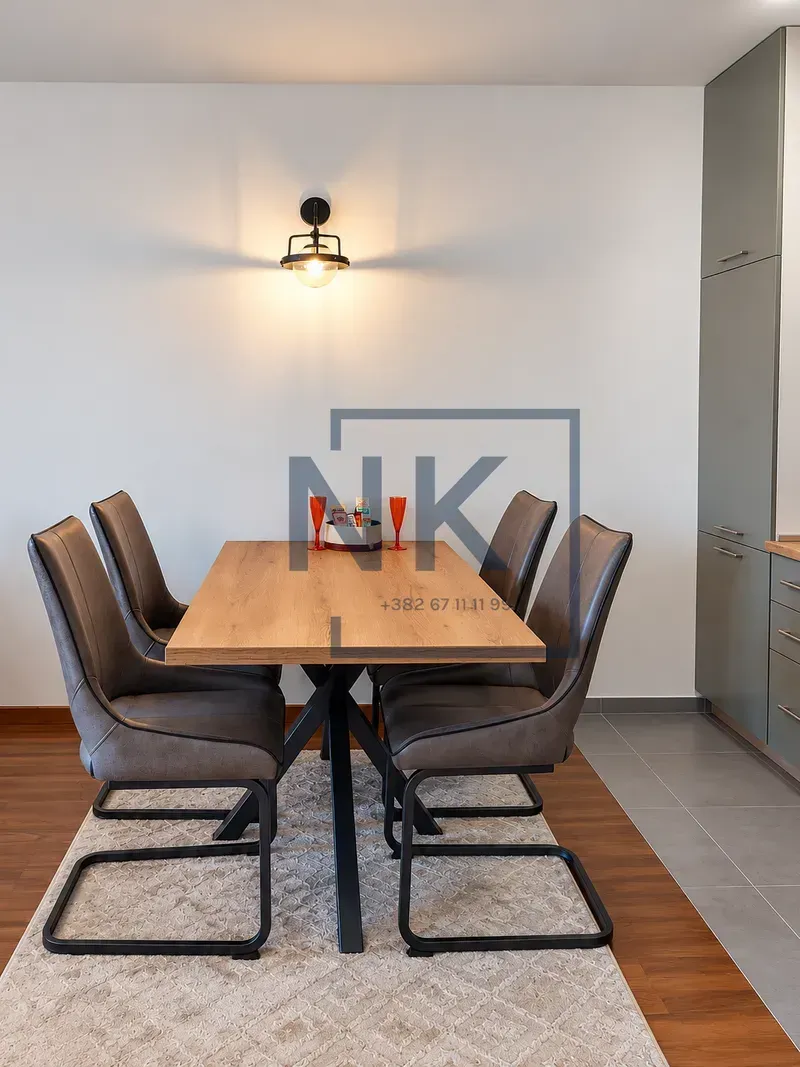 Dining table with chairs located in the kitchen area.