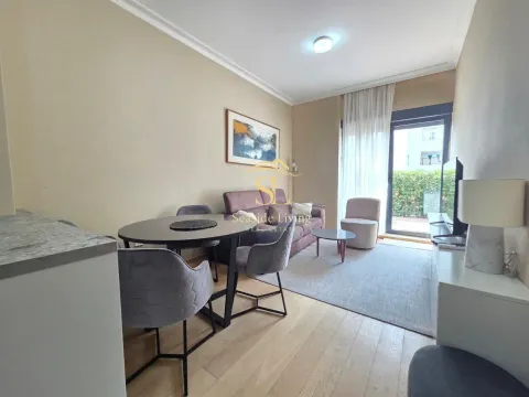 Living room with dining area and access to the terrace. - image 4