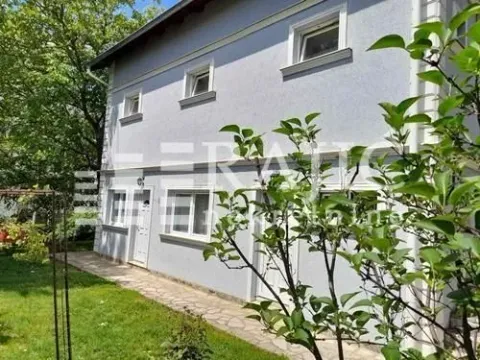 Exterior view of the house with a yard and walkway. - image 5