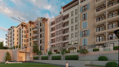 Exterior view of a multi-story residential building with balconies and a landscaped yard. - image 2