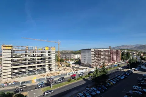 View from the terrace of a construction site and surrounding buildings under construction. - image 4