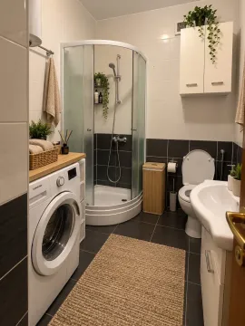 Uređeno kupatilo sa tuš kabinom, umivaonikom, wc šoljom i veš mašinom. - image 4