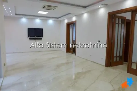 Spacious empty living room with a dropped ceiling and ceramic tile flooring. - image 4