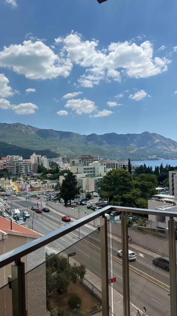 View of the city, surrounding mountains, and the sea from the terrace.