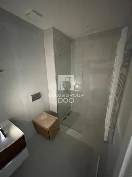 Newly equipped bathroom with a walk-in shower and vanity. - image 16