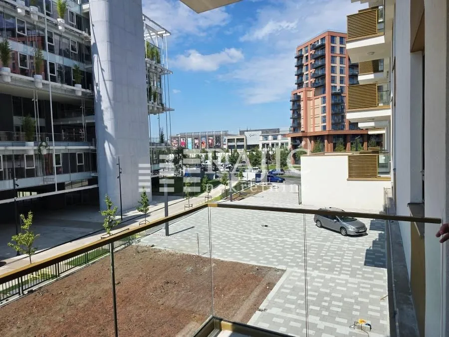 View from the terrace overlooking the urban neighborhood and surrounding buildings.