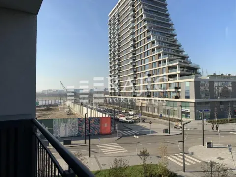 View from the terrace of a modern residential building and street. - image 14