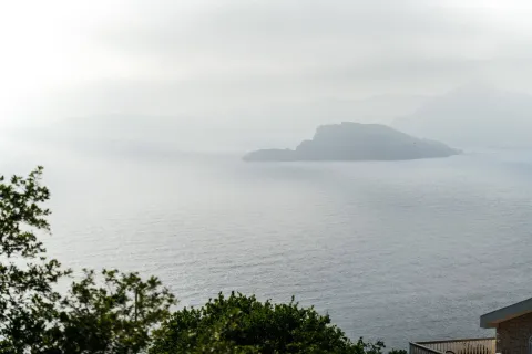 Beautiful view of the sea and an island from the terrace. - image 15