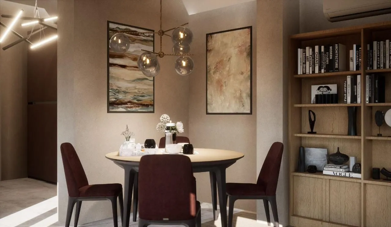 Dining area with a table, chairs, and a bookshelf.