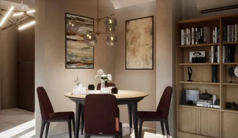 Dining area with a table, chairs, and a bookshelf. - image 13