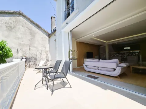 Terrace with seating set and view of the living room interior. - image 18
