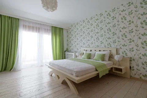 Bright and tidy bedroom with a double bed and green details. - image 5