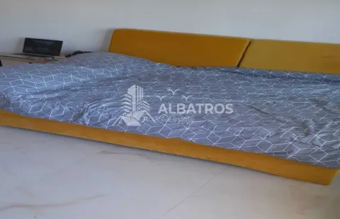Furnished bedroom with a double bed and bedding. - image 6