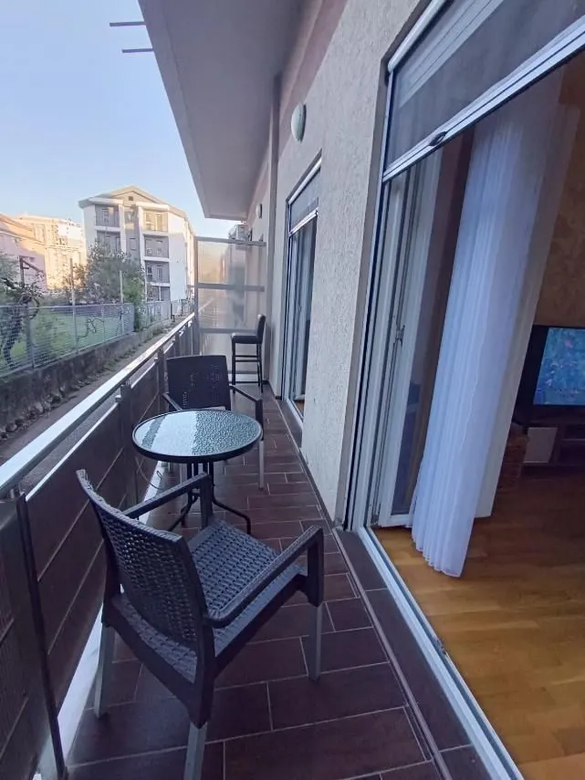 Furnished terrace with seating set.