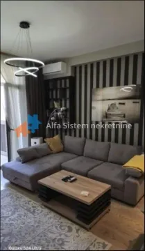 Dnevna soba sa ugaonom garniturom, klub stočićem i modernom rasvjetom. - image 3