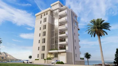 Exterior view of a modern residential building with balconies and sea view. - image 5