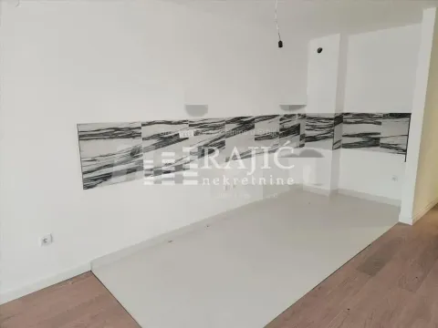 Empty kitchen with ceramic tiles and parquet flooring. - image 4
