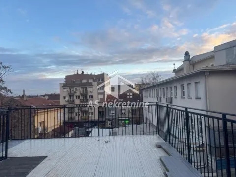 View of city buildings from a spacious terrace. - image 29