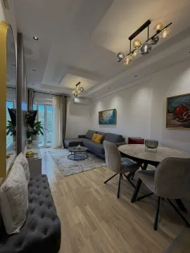 Modern and bright living room with a dining area. - image 7