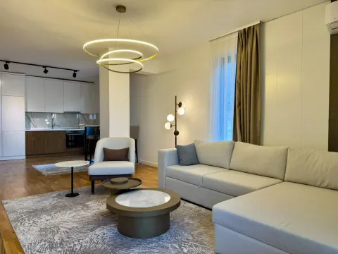 Modern living room connected to the dining area and kitchen. - image 4