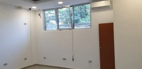 Empty room with a window and air conditioning. - image 2