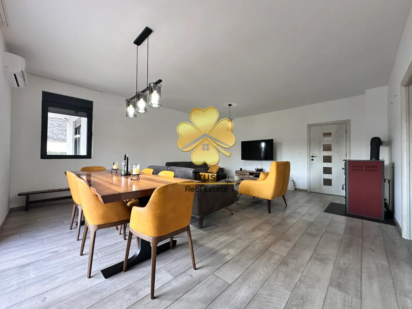 Spacious living room with a dining area and modern furniture.