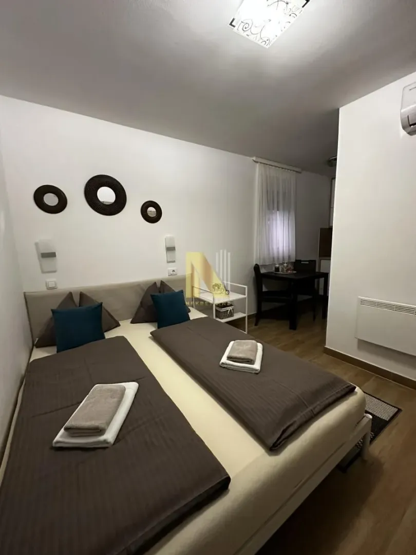Decorated bedroom with a double bed.