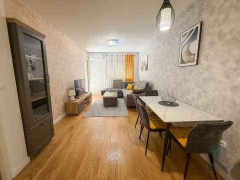 Living room with dining area, sofa set and TV. - image 3