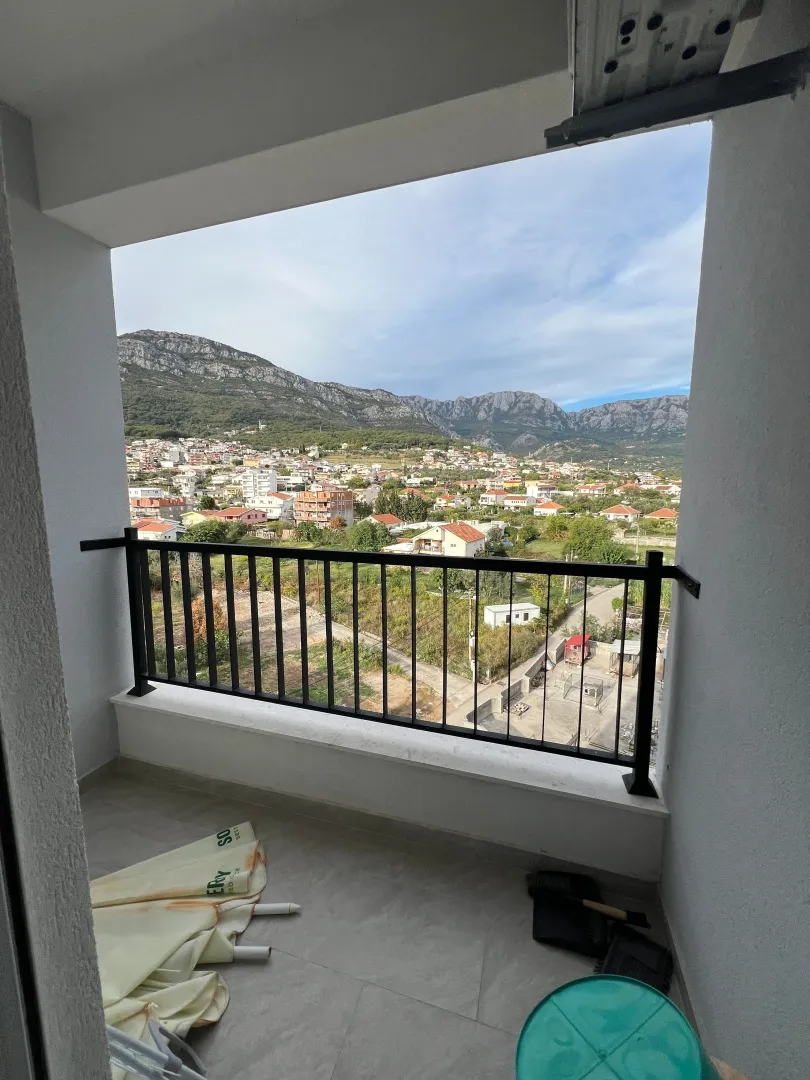 View of the surrounding settlement and mountains from the balcony.