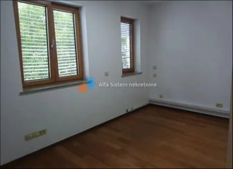 Empty room with wooden flooring and windows. - image 17