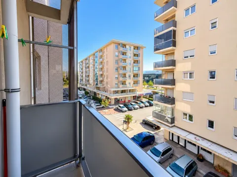 City and building view from the apartment terrace. - image 9