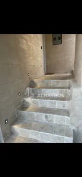 Stone-clad entrance stairs with built-in lighting. - image 13