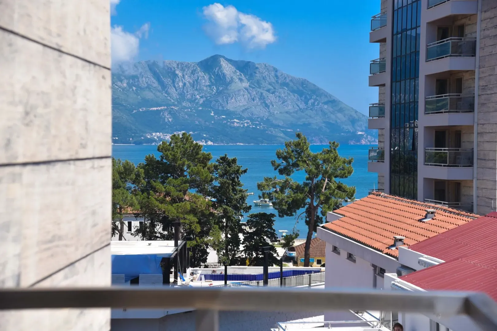 View from the terrace towards the sea and mountains.