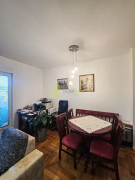 Living room with a dining table and a work corner. - image 5