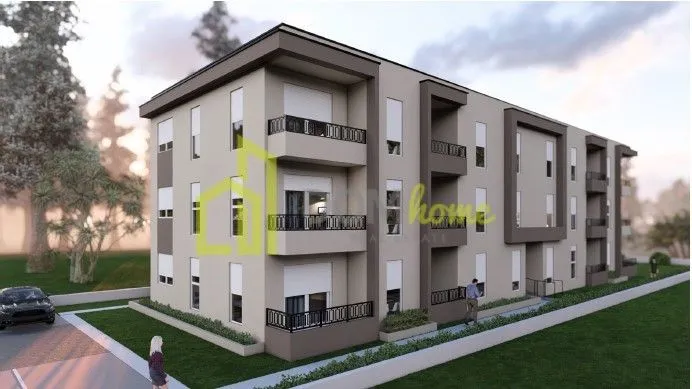 3D rendering of the exterior of a modern apartment building with balconies and a landscaped yard.