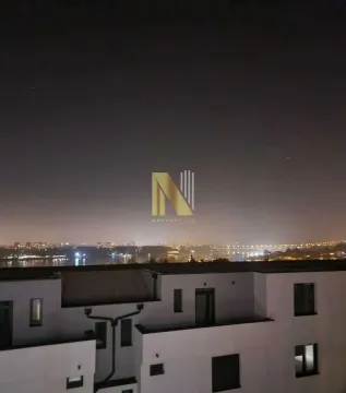 Noćni pogled sa terase na grad i reku. - image 19