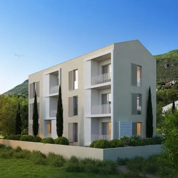 Spoljašnji izgled moderne stambene zgrade sa terasama i uređenim dvorištem. - image 3
