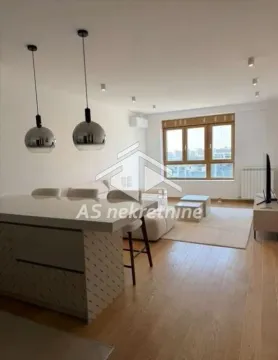 Spacious living room connected with dining area and kitchen. - image 4