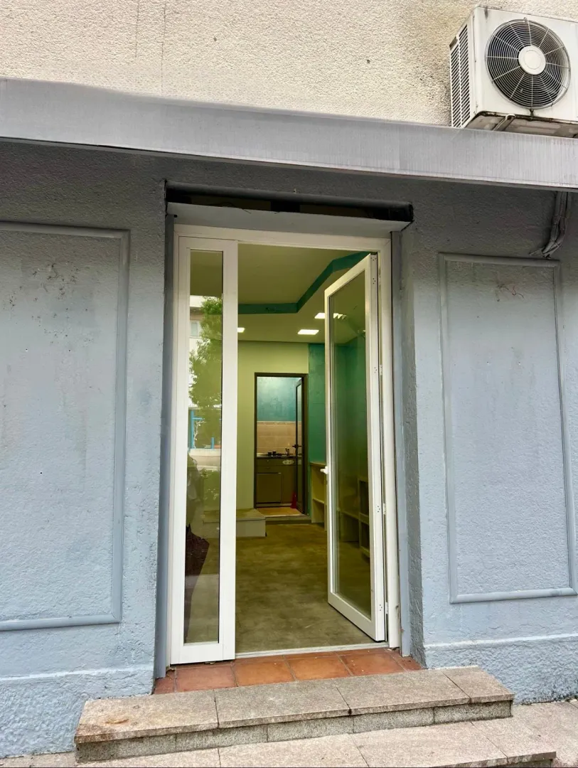 Commercial space entrance with glass doors.