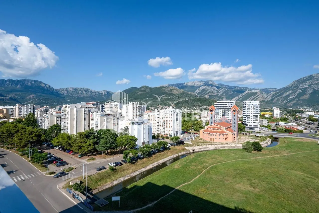 View from the terrace overlooking the city and surrounding mountains.